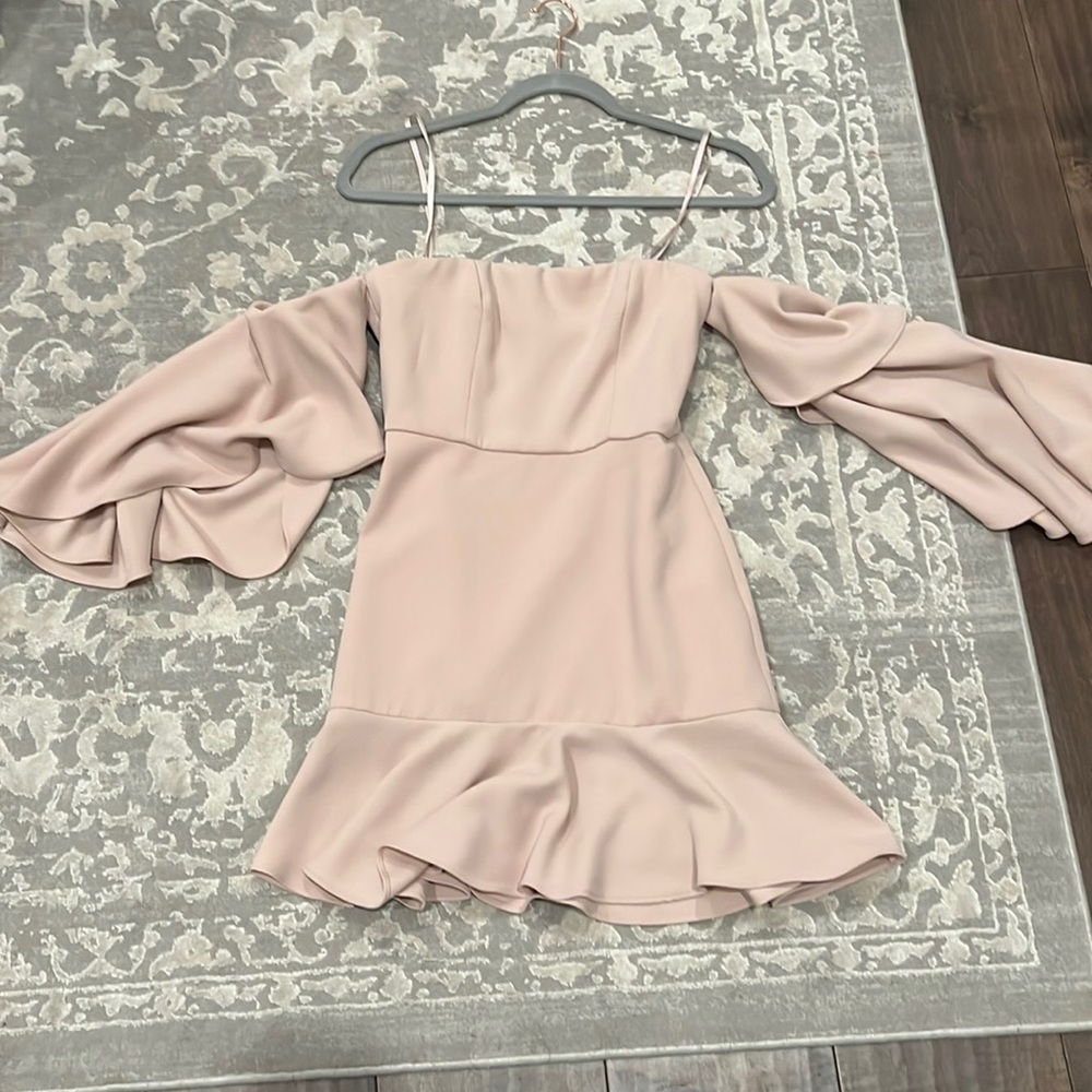 Cream color BCBG dress. No rips, tears or stains.